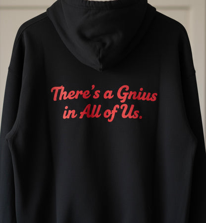 Black Triumph hoodie by shopgnius featuring a front pocket and drawstring hood, displayed on a hanger.
