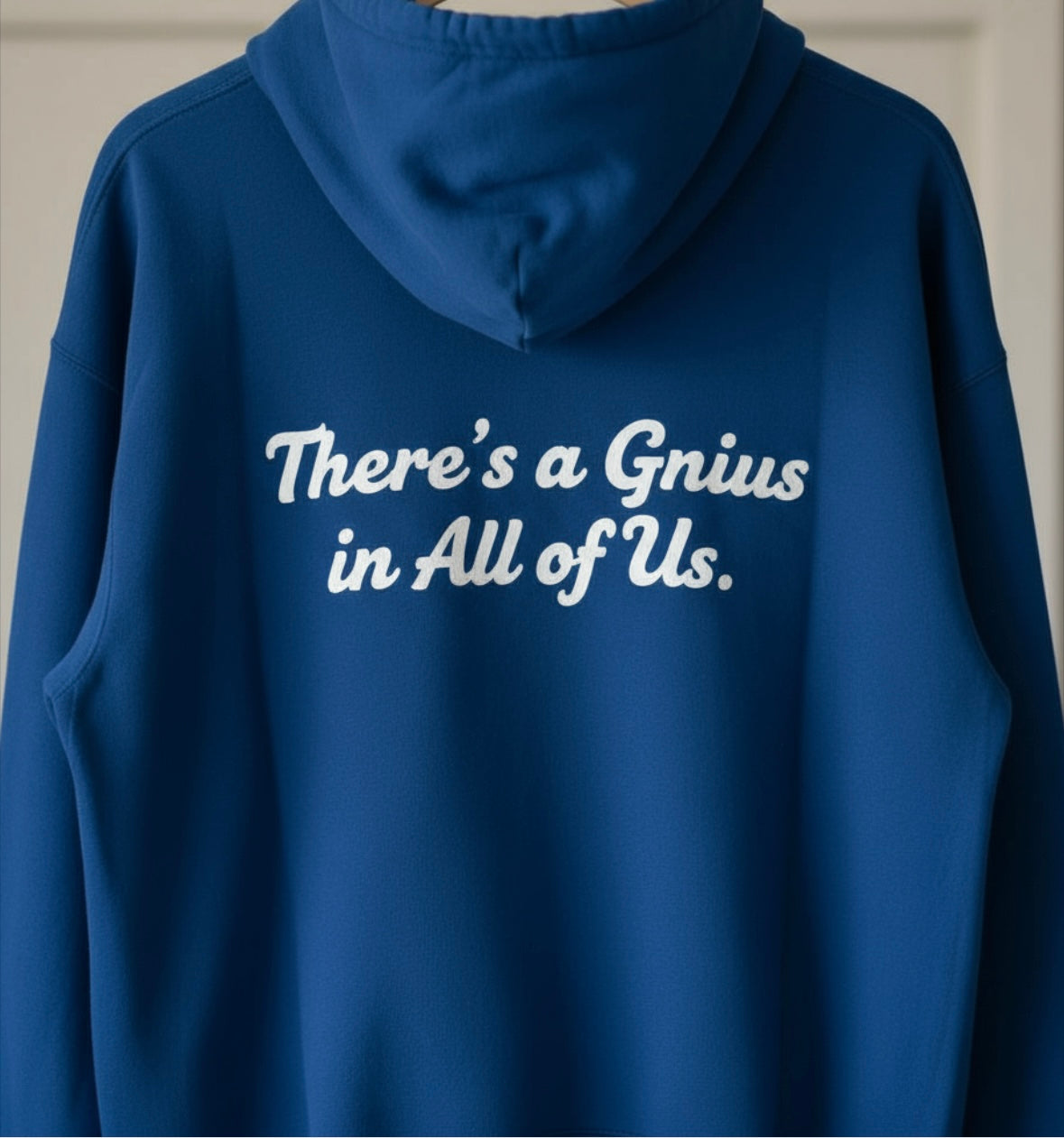 Black Resilience Hoodie by shopgnius featuring a front pocket and adjustable drawstrings, shown on a model.
