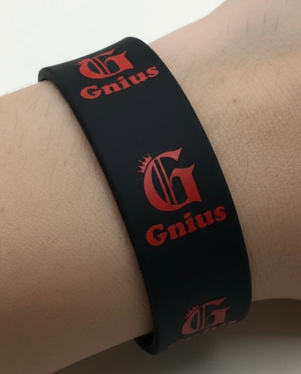 Gnius wristbands by Gnius Myndz Clothing, black fabric wristbands with logo, styled for casual or athletic wear.