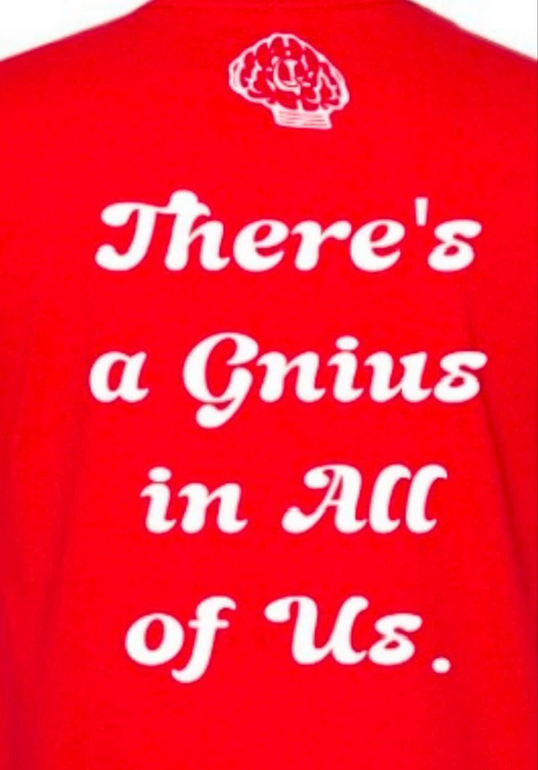 Smart graphic T-shirt by shopgnius featuring a vibrant inspire design, worn casually with visible fabric details.